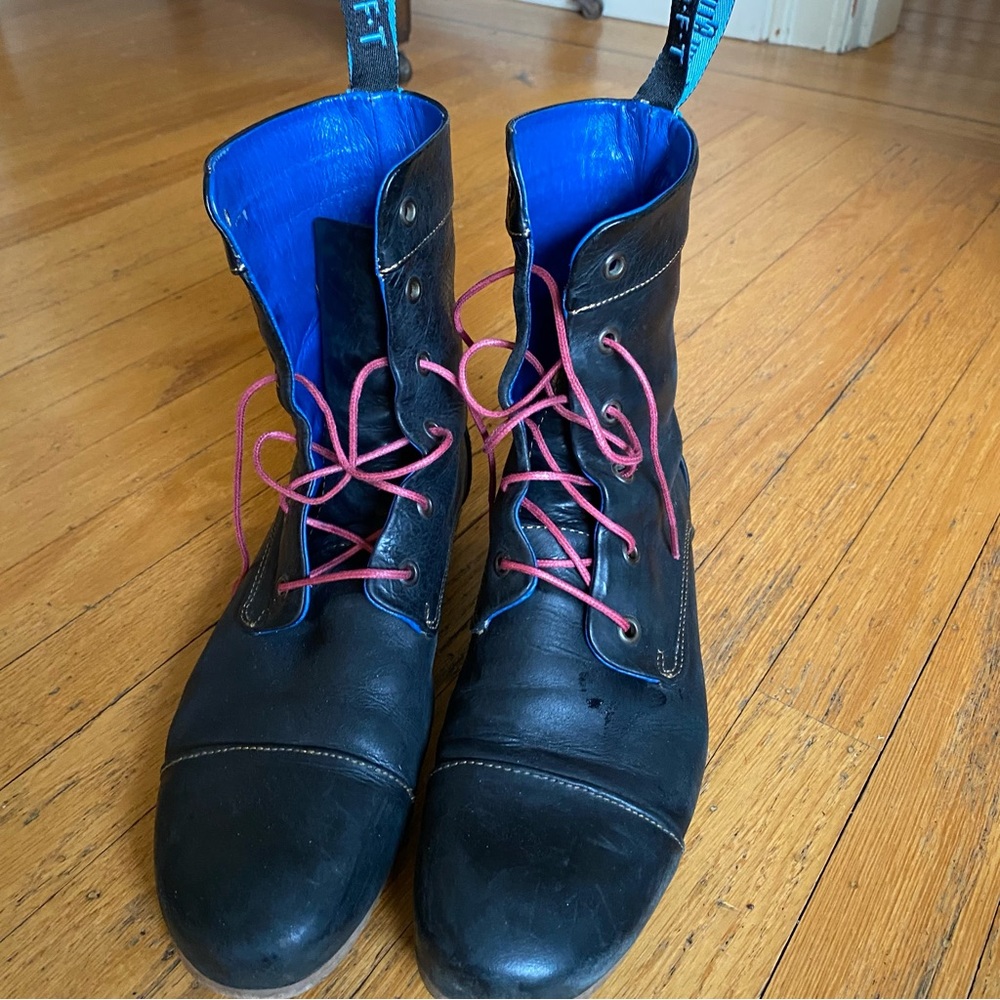Black Fluevog CBC lace up boots.